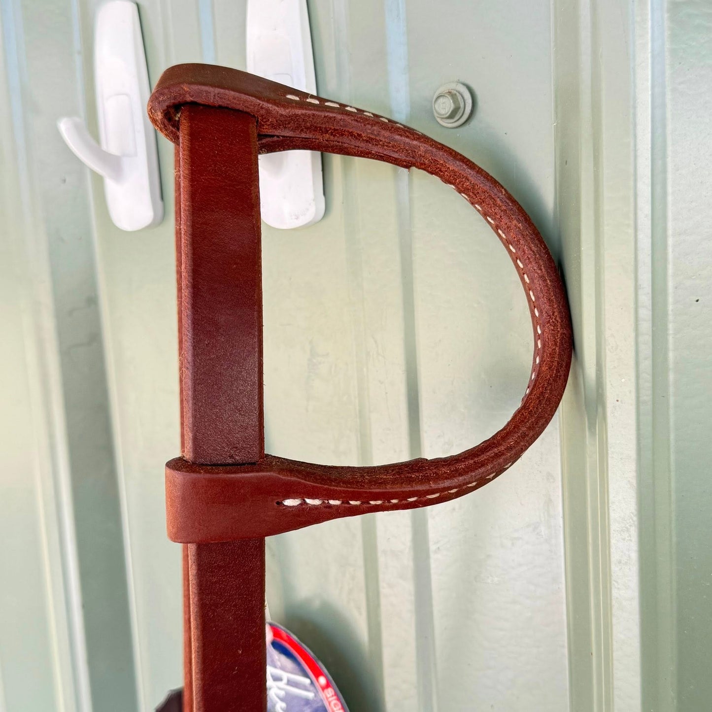 Rolled sliding one ear design on premium oiled leather headstall