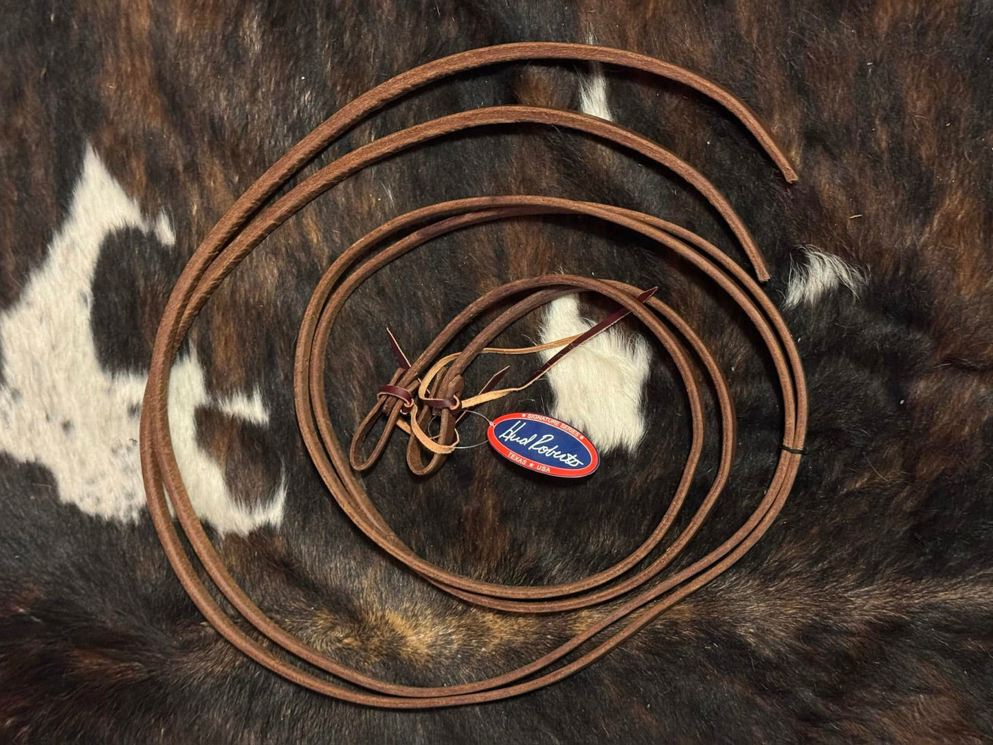 Split weighted reins 5/8 inch x 8 ft made from premium harness leather, oiled for soft feel and balanced control, handcrafted in the USA.