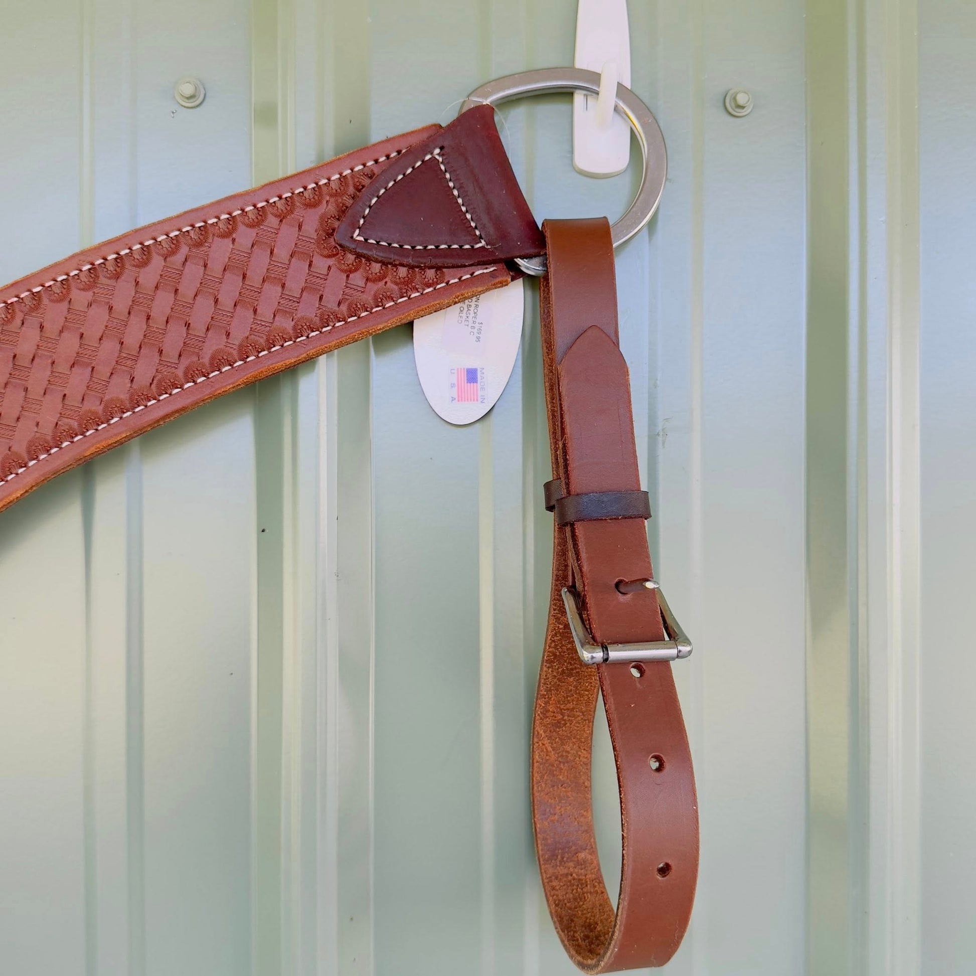 Stainless steel hardware on hand-tooled leather breast collar
