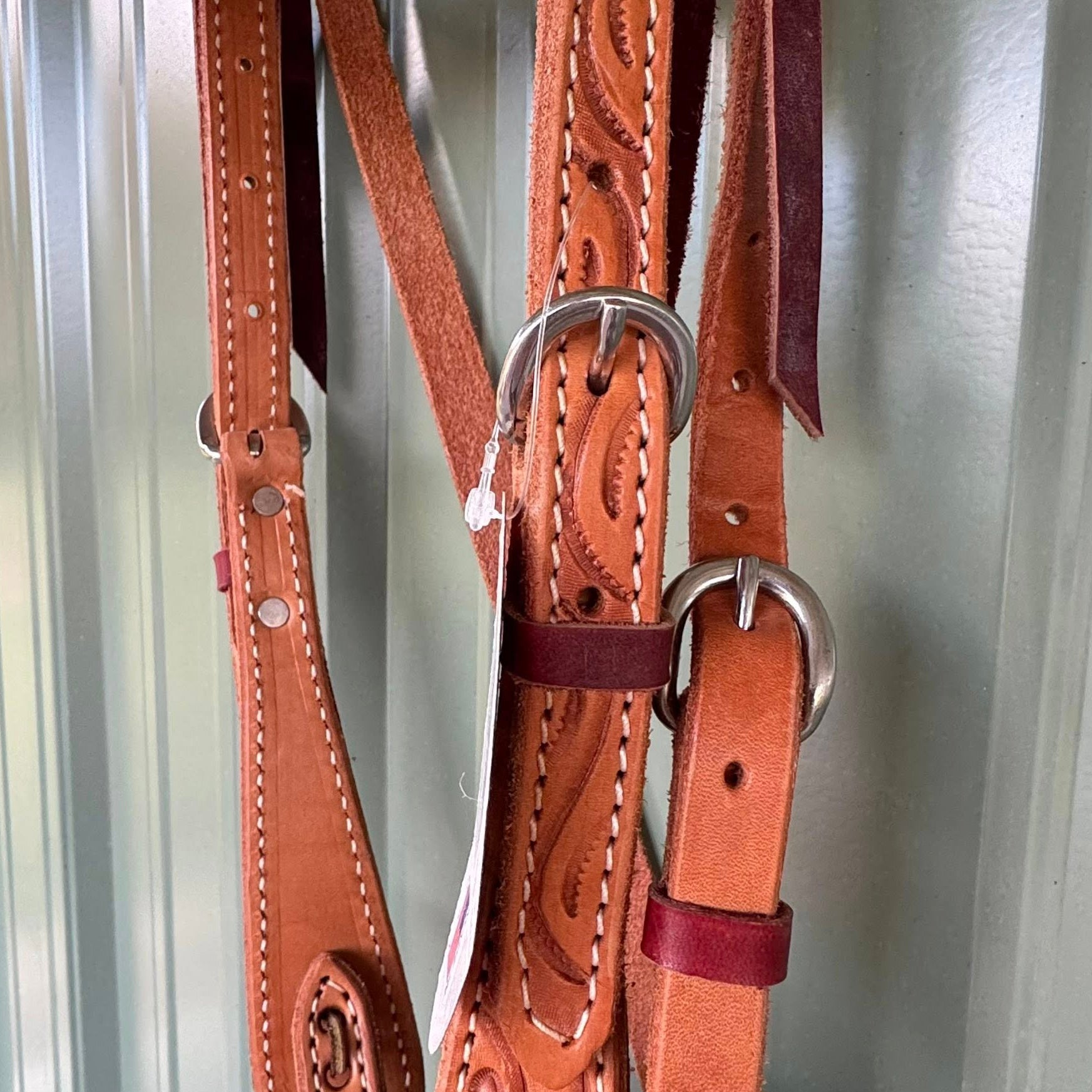 Close up of hand tooling swirl pattern