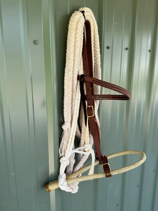 Browband Bosal Hack Set with rawhide braided bosal, oiled leather 5/8 inch headstall, and 14 foot cotton reins. Fits average Quarter Horse. Handcrafted in the USA by HR Saddlery.