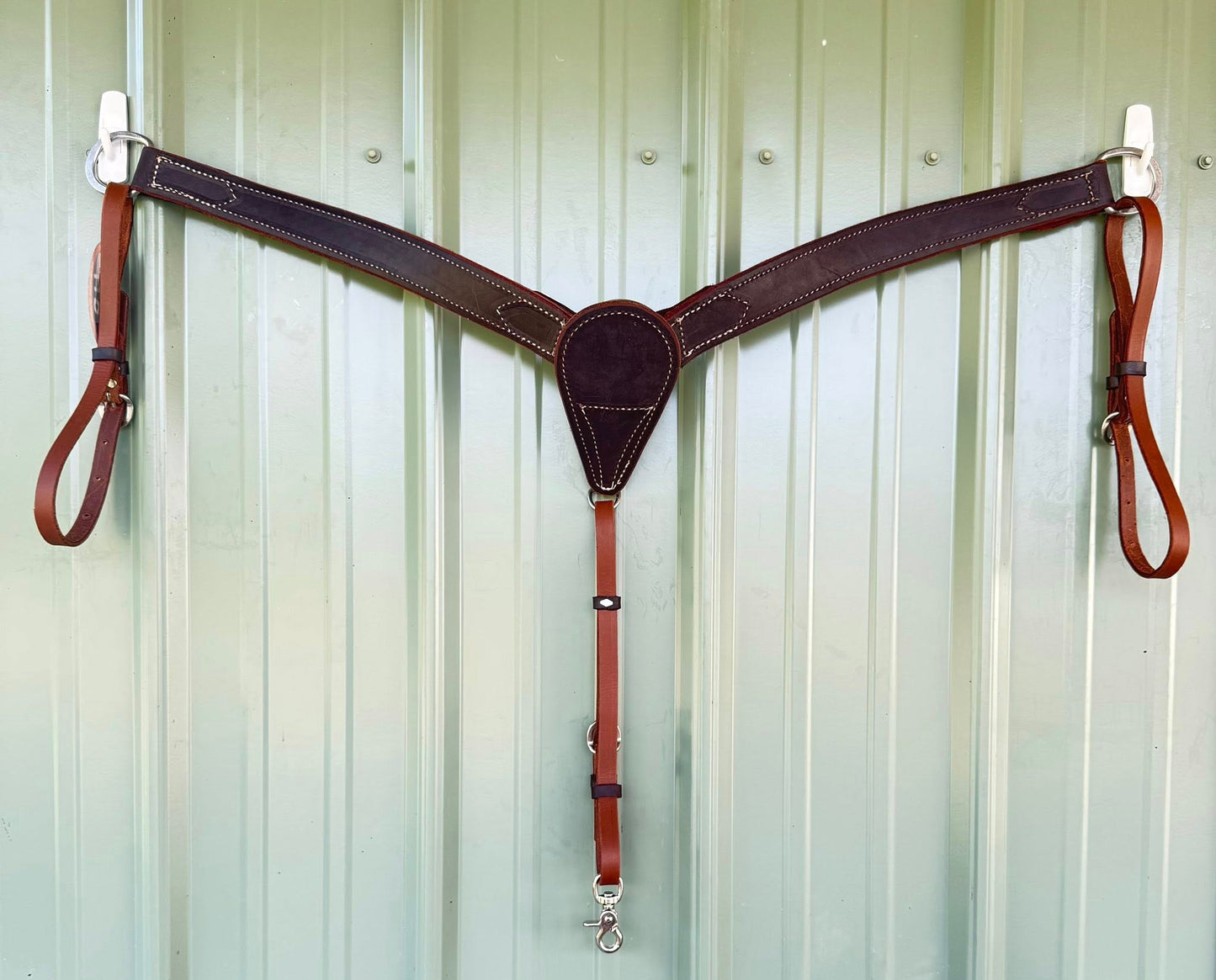 Stainless steel hardware on hand-tooled leather breast collar