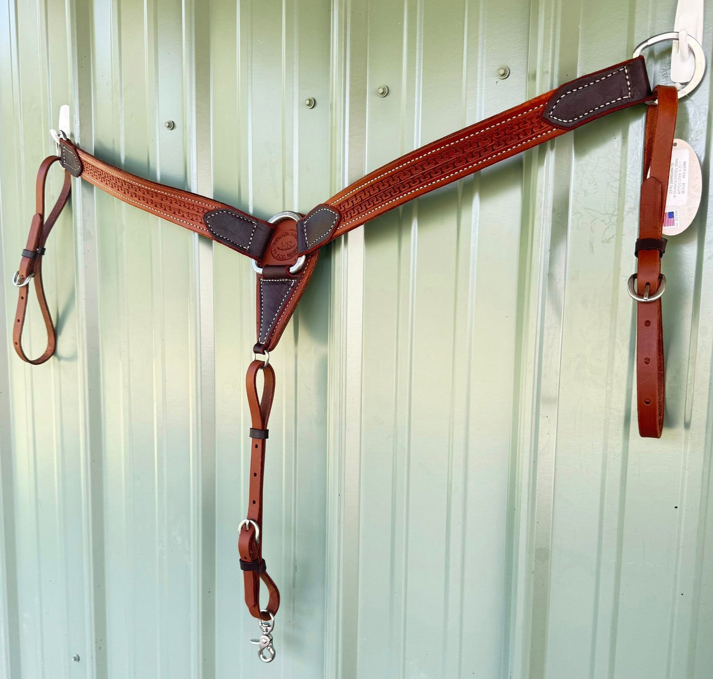 Running W breast collar – flat lay, medium-brown oiled leather