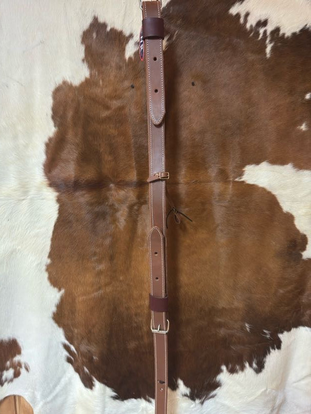 1 3/4 inch double stitched leather back cinch with billets and nickel-plated hardware
