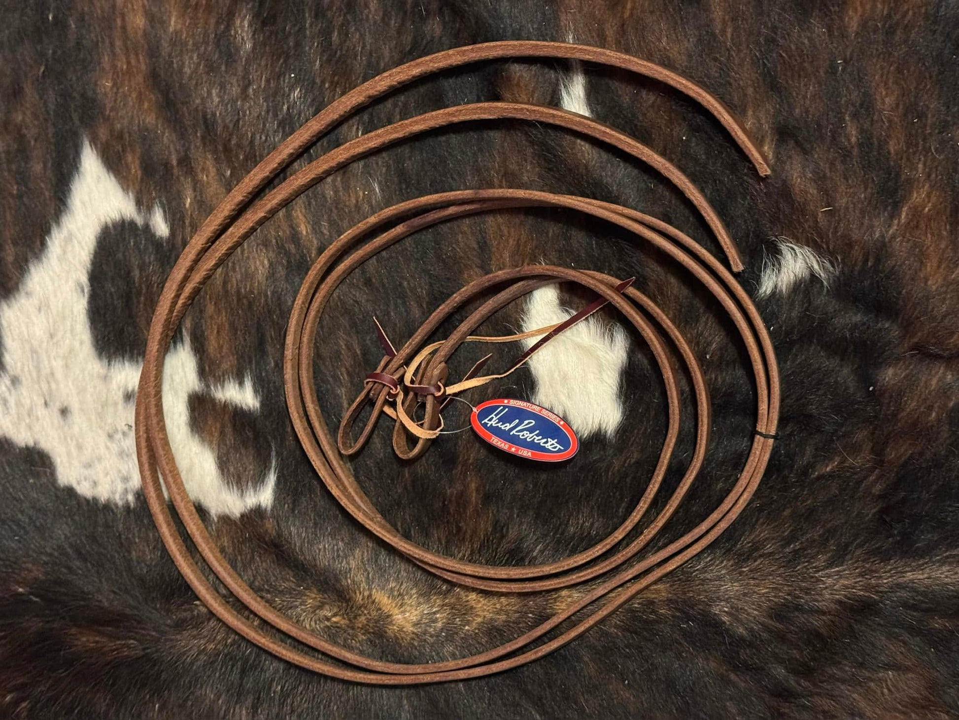 Split weighted reins 5/8 inch x 8 ft made from premium harness leather, oiled for soft feel and balanced control, handcrafted in the USA.