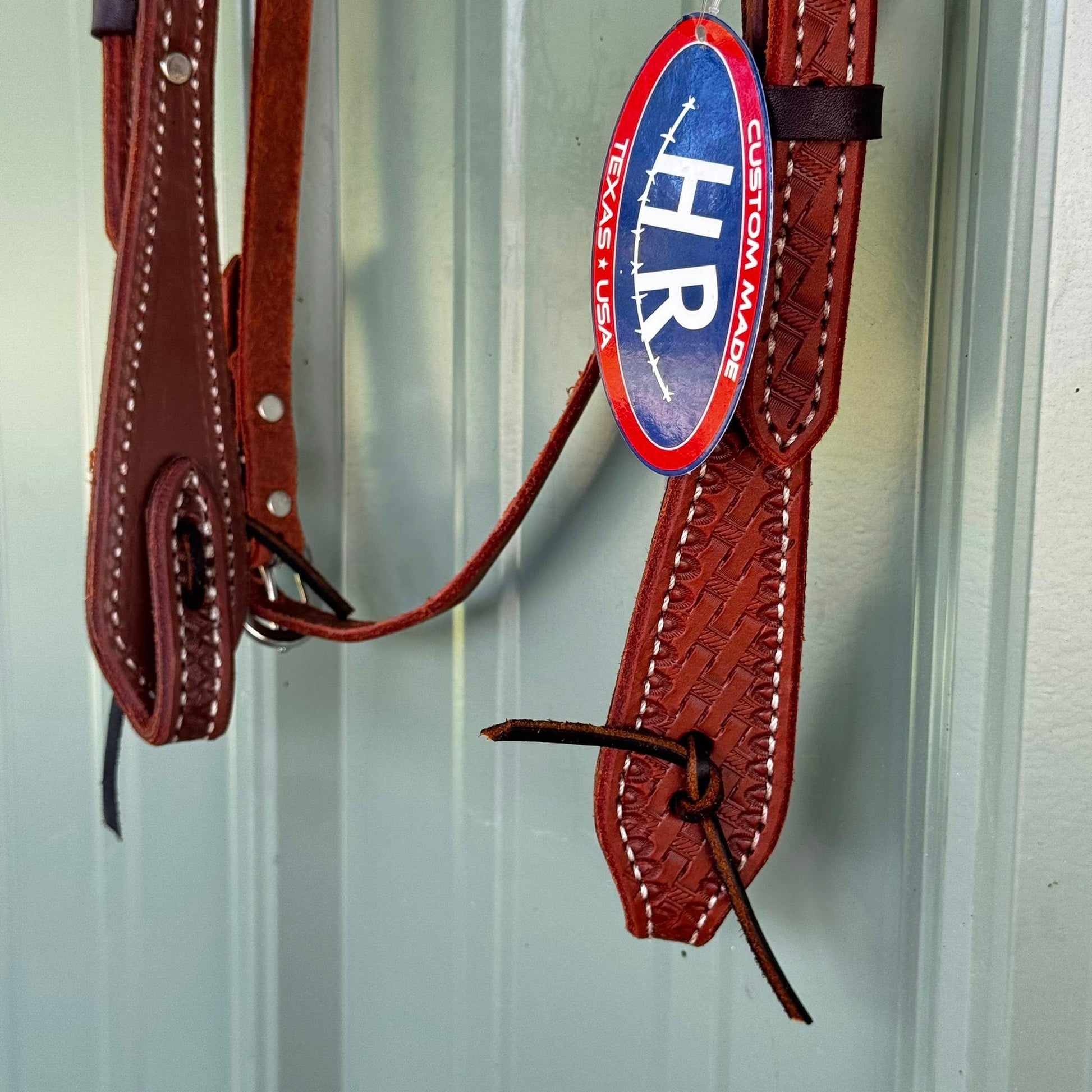 Western headstall with hand-tooled basket weave detail