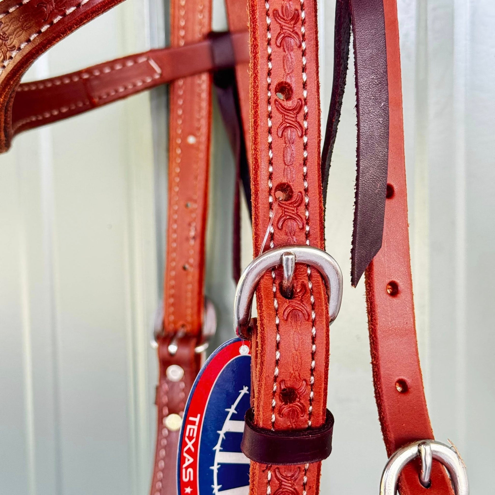 Stainless steel hardware on hand tooled leather headstall