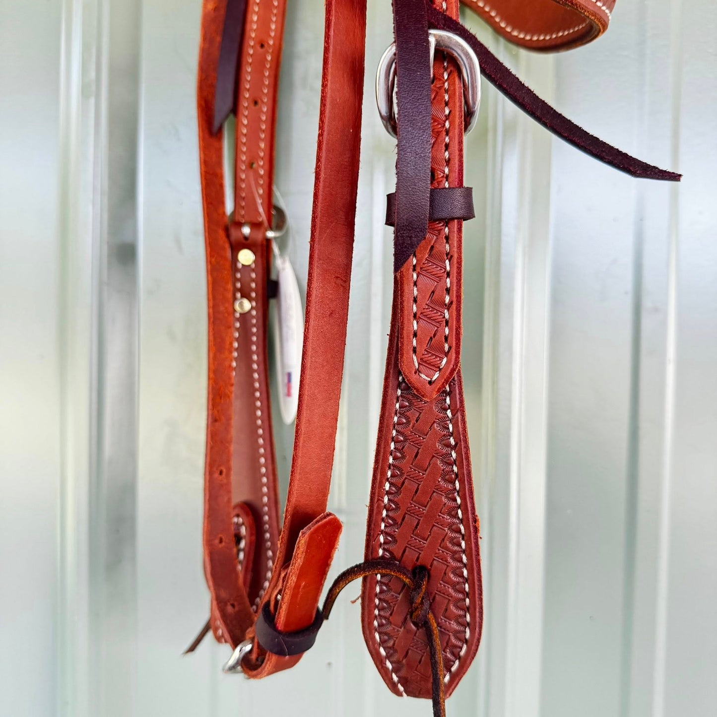Stainless steel hardware on hand tooled leather headstall
